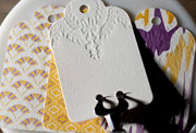 Town letterpress and flat printed hang tags